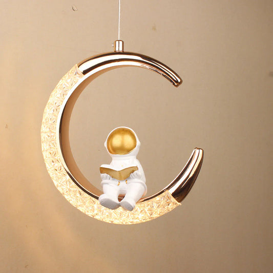 Astronaut Sitting on Illuminated Crescent Moon Pendant Light – Gold & White