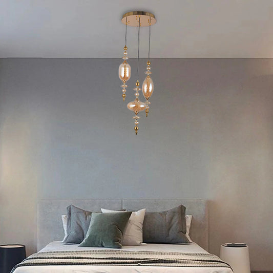 Baroque Crystal Trio – Ornate Amber Glass Chandelier