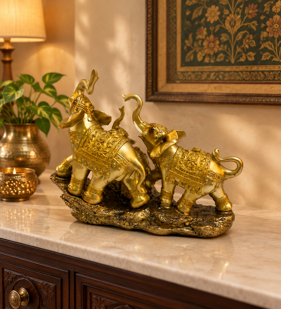 Majestic Polished Gold Ceremonial Elephant Pair on Rocky Base