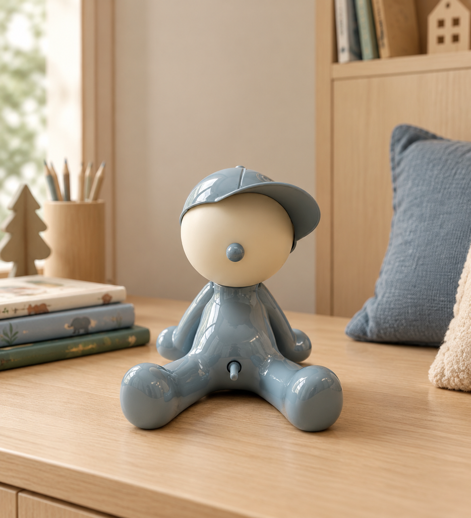Whimsical Glossy Blue Seated Figurine with Cap