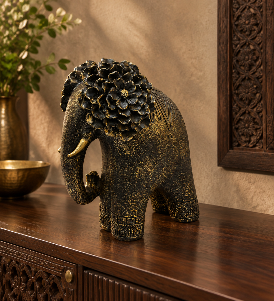 Ornate Antique Bronze and Gold Elephant Figurine with Floral Head Detail