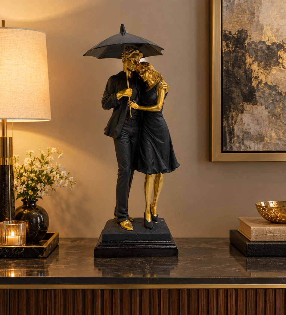 Black and Gold Romantic Couple Under Umbrella Sculpture