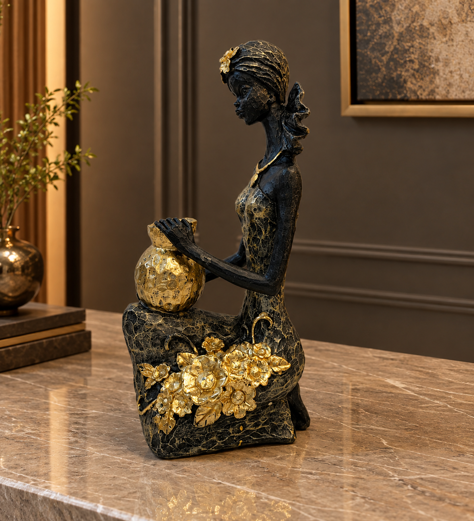African Lady Sculpture Holding Gold Pot with Floral Accents