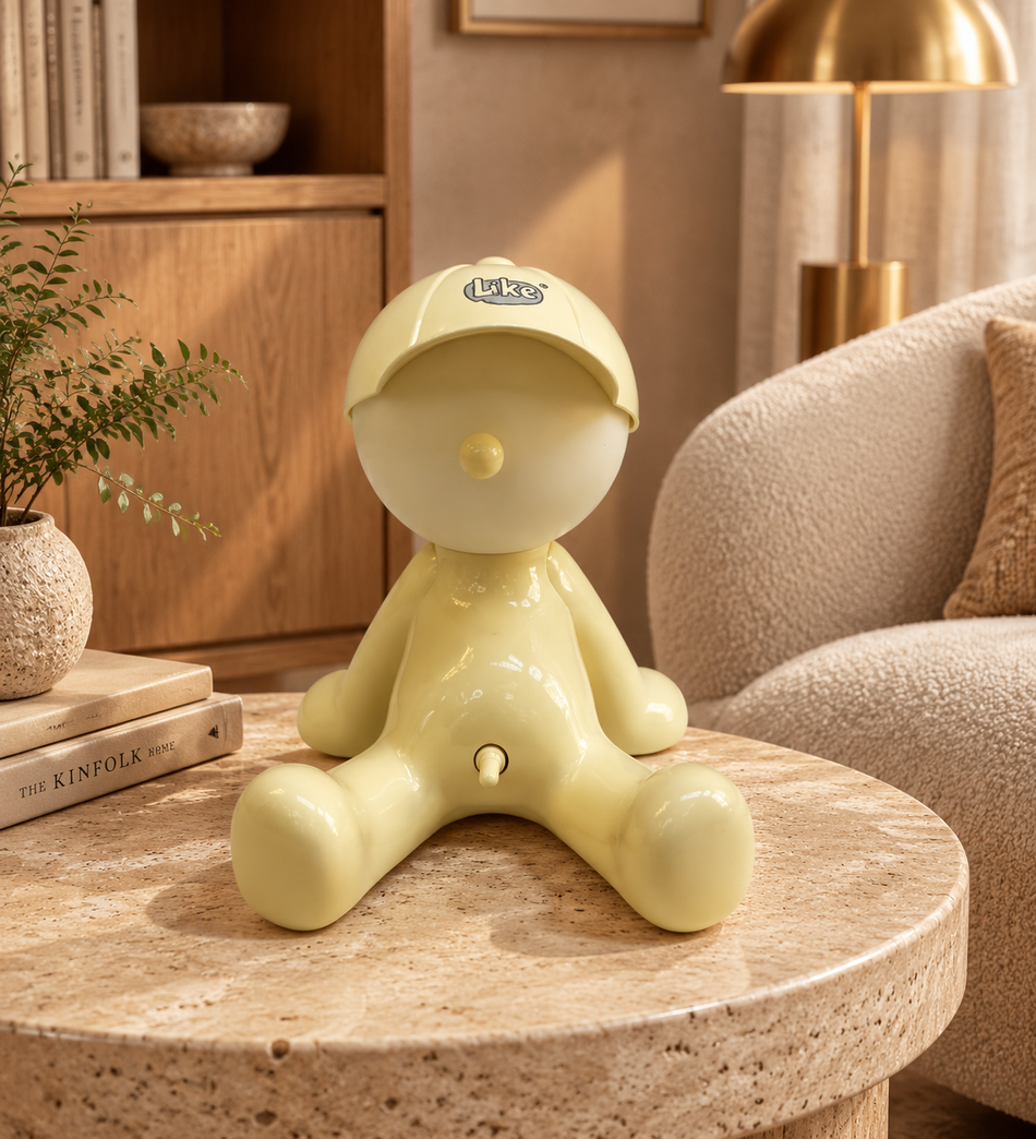 Whimsical Glowing Yellow Seated Figurine Lamp with Cap