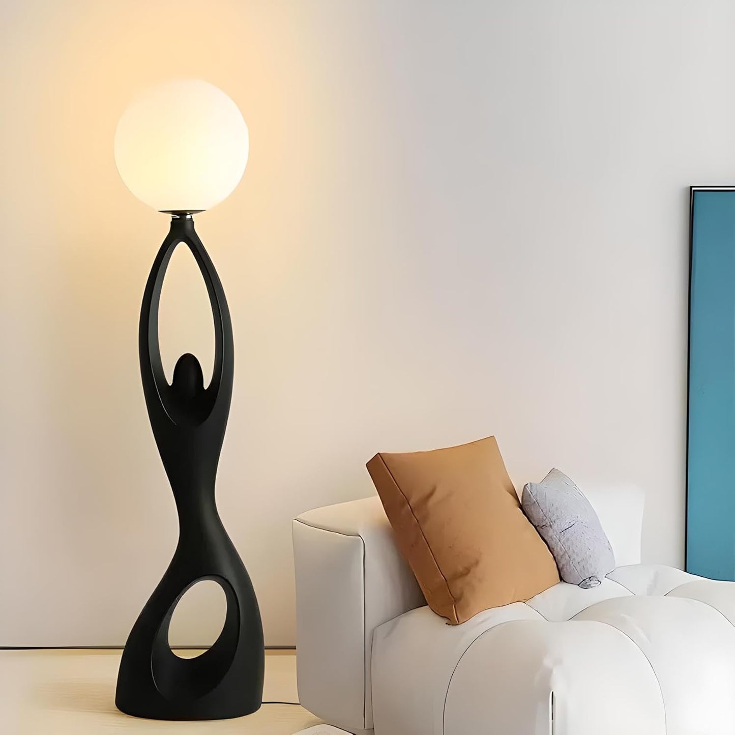 Designer Black sculpture holding ball Floor Lamp