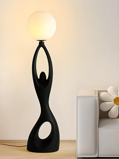 Designer Black sculpture holding ball Floor Lamp