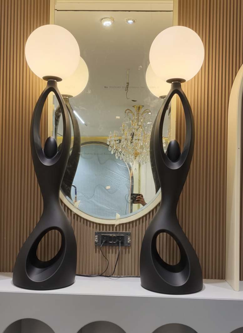 Designer Black sculpture holding ball Floor Lamp