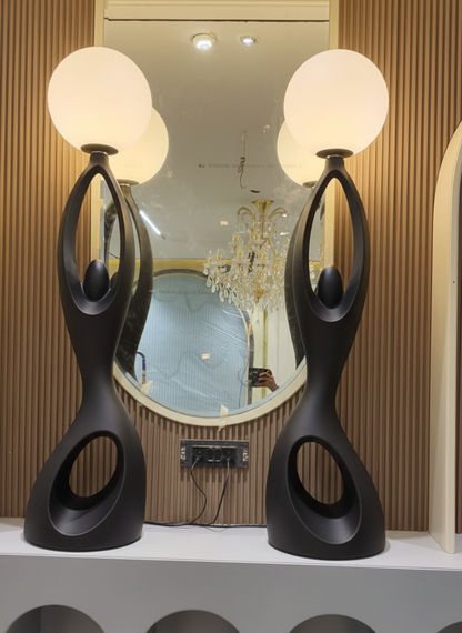 Designer Black sculpture holding ball Floor Lamp