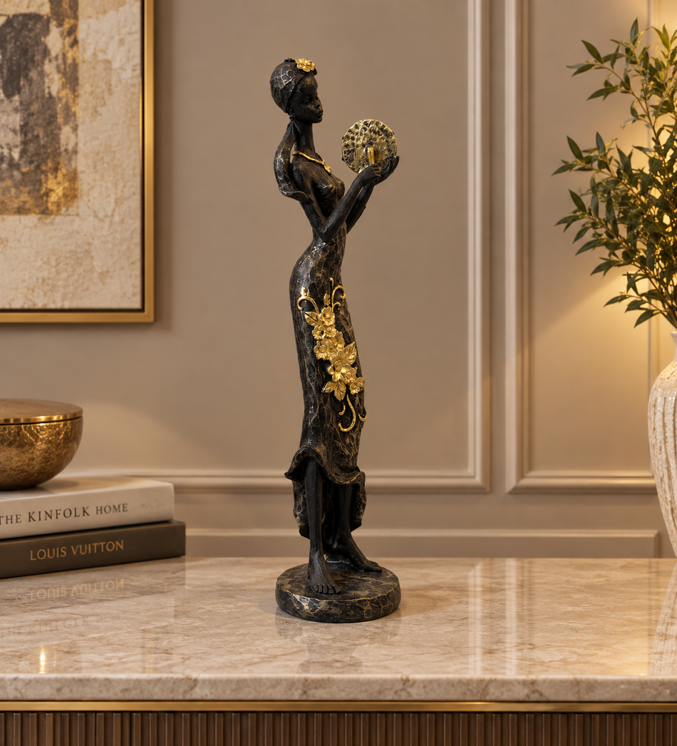 African Lady Figurine with Fan and Gold Floral Accents