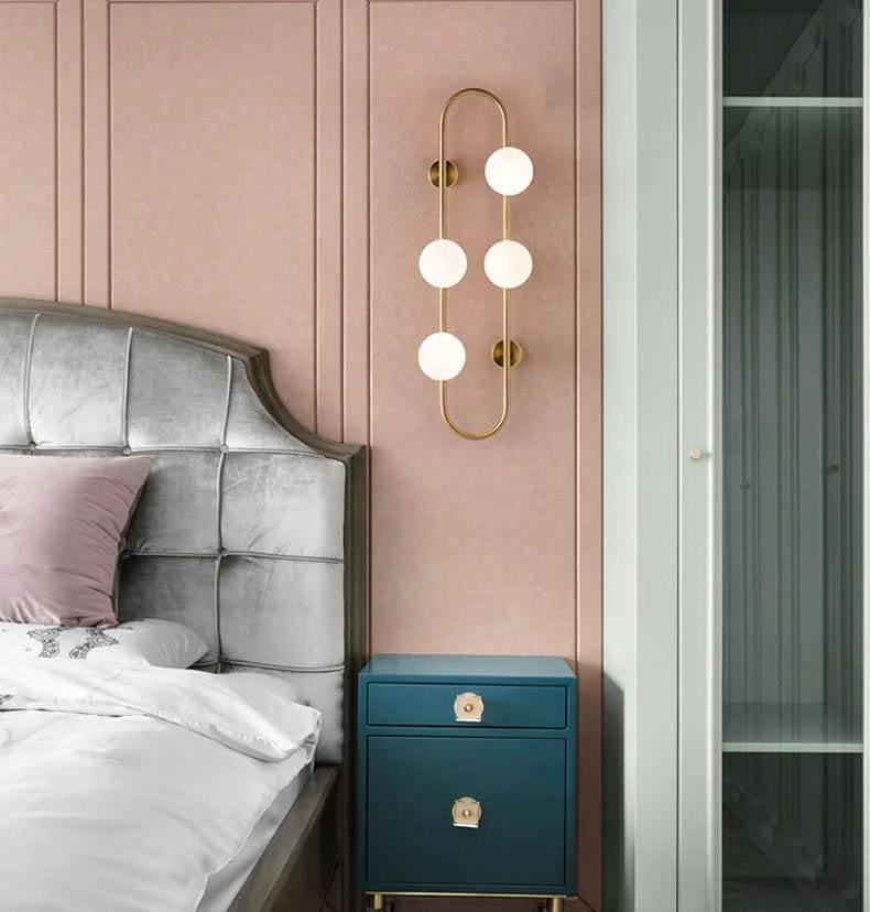 4 Light Gold Frosted Glass Ball Wall Light